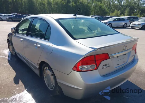 2010 Honda Civic Hybrid z USA, uszkodzony, nr VIN JHMFA3F28AS004965